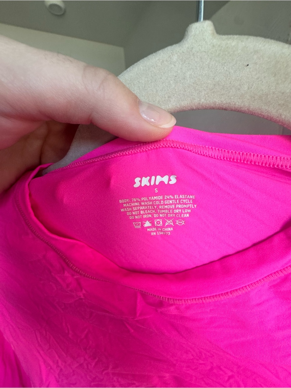 SKIMS Fits Everybody Long-Sleeve Top in Neon Pink - Picture 3 of 3